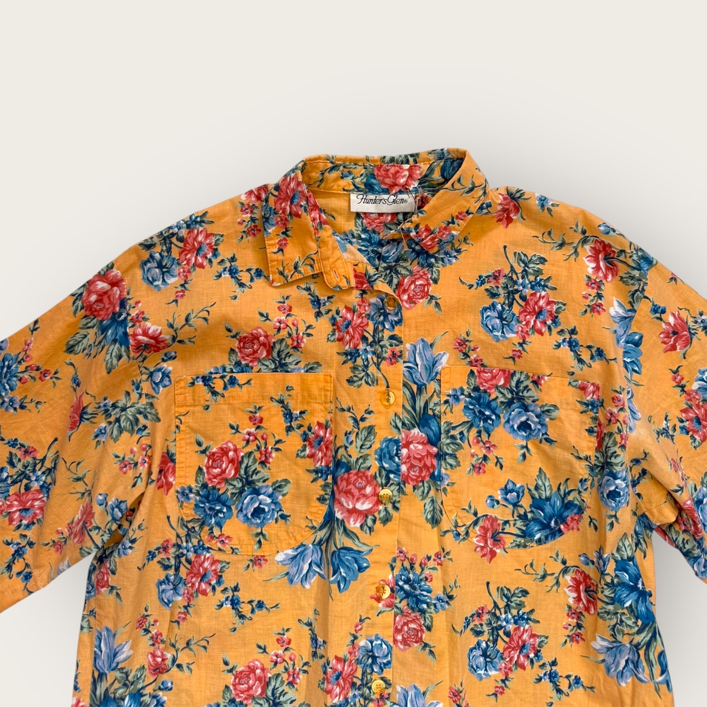 Orange floral print shirt