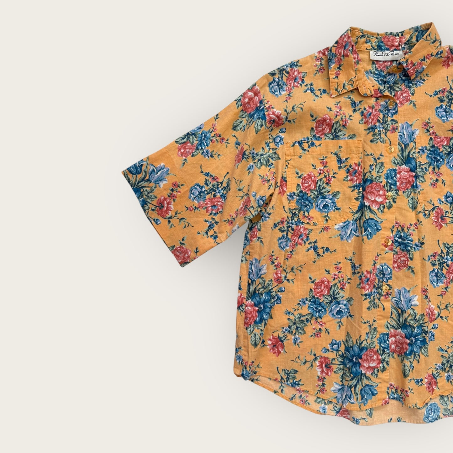 Orange floral print shirt